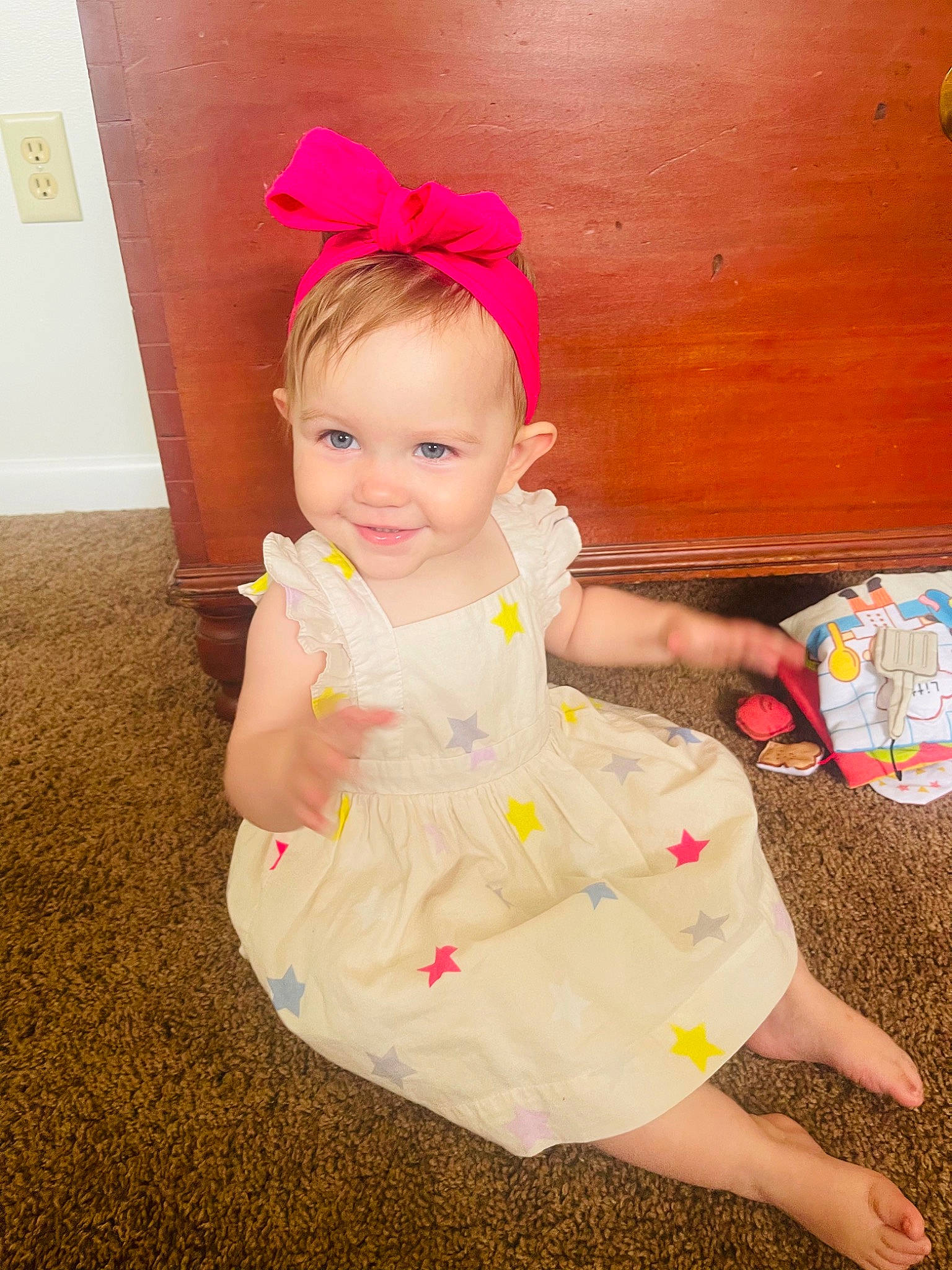 Isla joined the competition — help win amazing prizes! baby, baby_toddler_clothing, cheek, child, dress, eye, face, facial_expression, fun, grass, happy, headband, headpiece, human_body, joy, magenta, person, pink, skin, sleeve