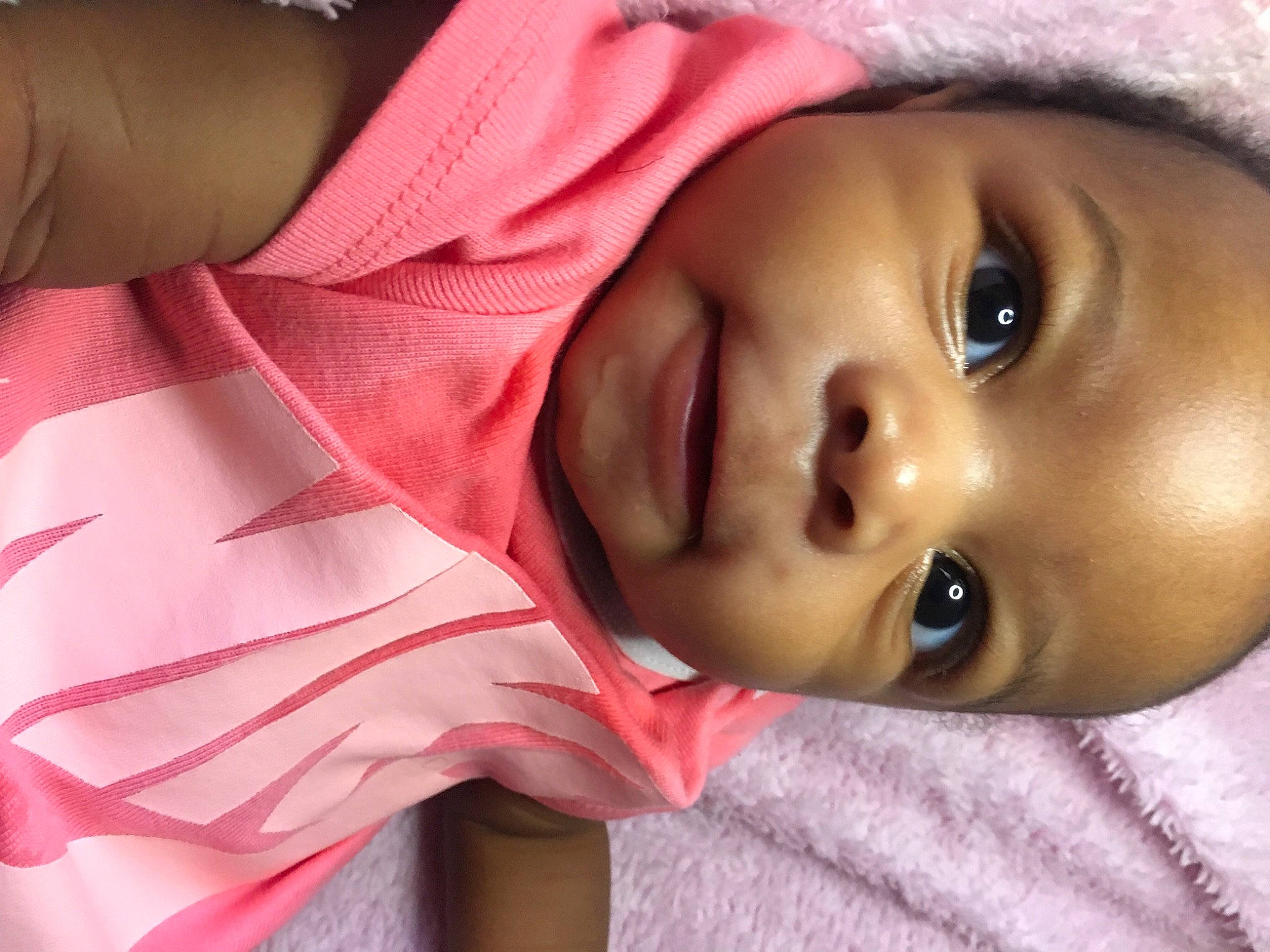 Za'Niyah is registered to the contest to win money with this photo: baby, cheek, chin, eye, eyebrow, eyelash, face, facial_expression, happy, head, human_body, iris, lip, mouth, neck, nose, person, pink, skin, sleeve