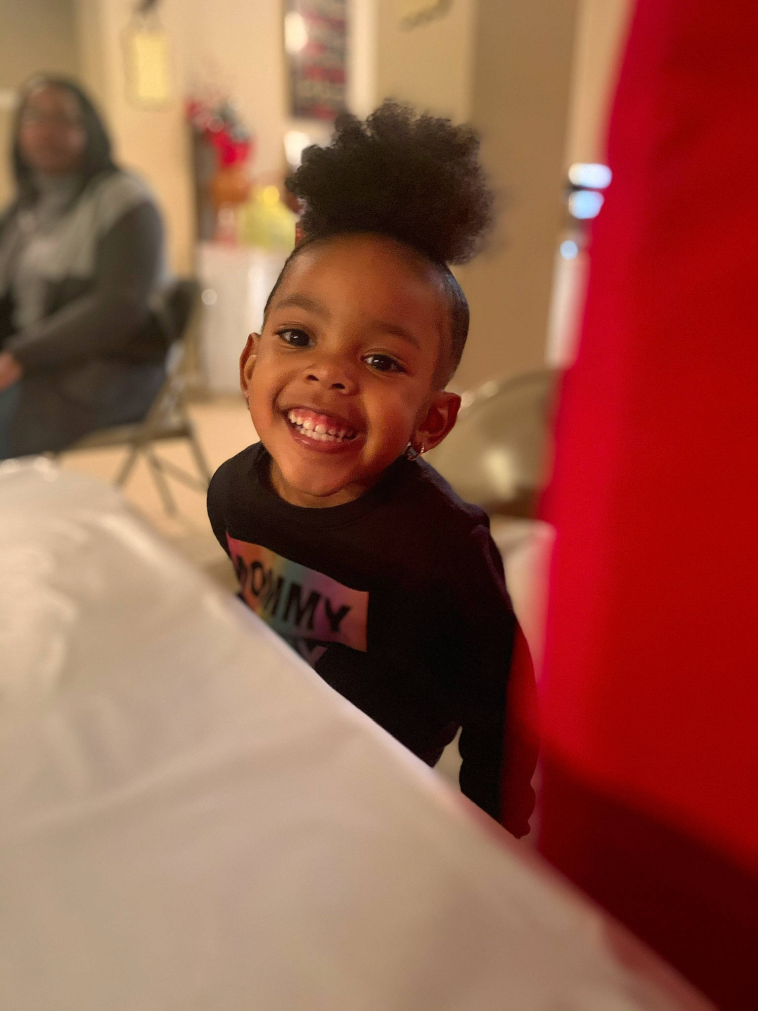 Amaia is registered to the contest to win money with this photo: child, face, facial_expression, fun, happy, head, joy, laugh, person, pink, skin, smile, toddler, under_exposed, vacation