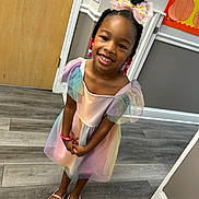 Madison joined the competition — help win amazing prizes! accessories, beads, bow, child, colorful, cute, door, dress, fashion, floor, girl, hair, happy, interior, portrait, shoes, smiling, standing, wall, wooden_floor
