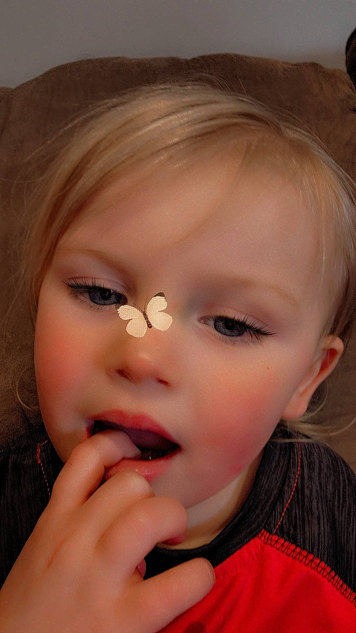 Eli is registered to the contest to win money with this photo: baby, cheek, ear, eyebrow, eyelash, face, flash_photography, forehead, gesture, hair, happy, iris, jaw, lip, mouth, neck, nose, person, skin, smile