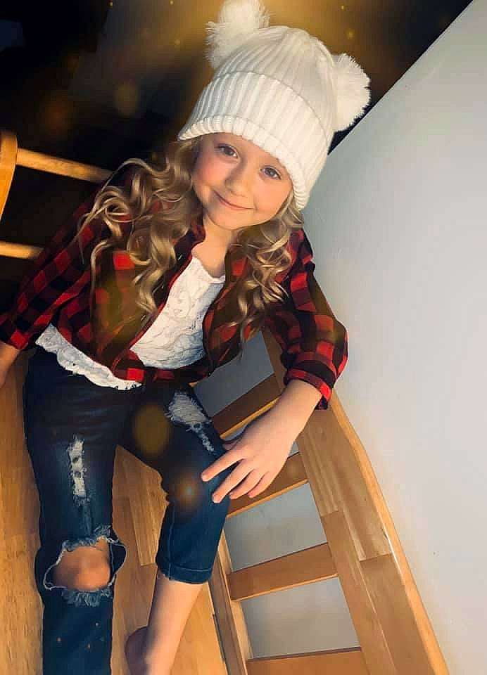 Aleah is registered to the contest to win money with this photo: headwear, joy, leg, person