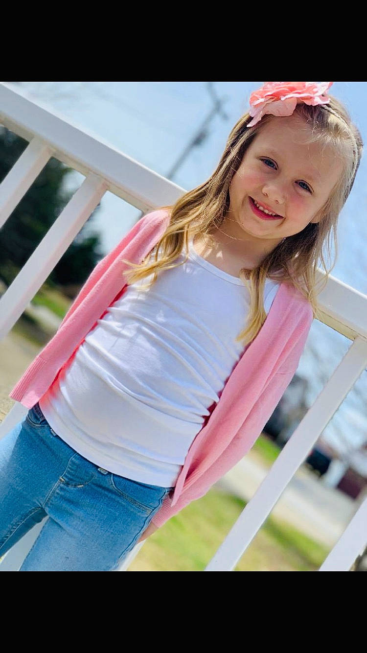 Aleah Ryan is registered to the contest to win money with this photo: abdomen, beauty, blond, child, child_model, hair, happy, jeans, joy, long_hair, model, neck, person, photo_shoot, photography, pink, shoulder, sleeve, smile, t_shirt