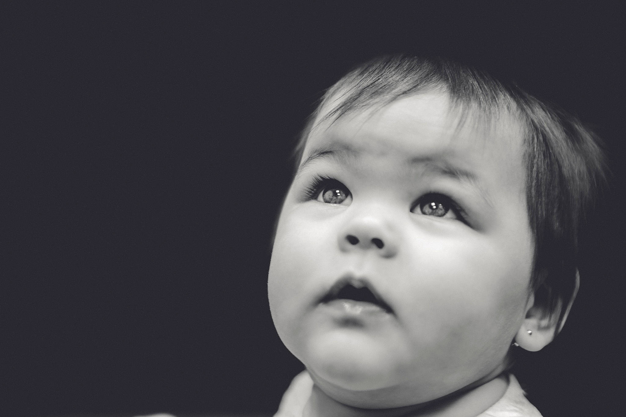 Pandora is registered to the contest to win money with this photo: baby, black, black_and_white, cheek, child, chin, close_up, eye, face, facial_expression, head, lip, monochrome, monochrome_photography, nose, person, photograph, photography, skin, toddler