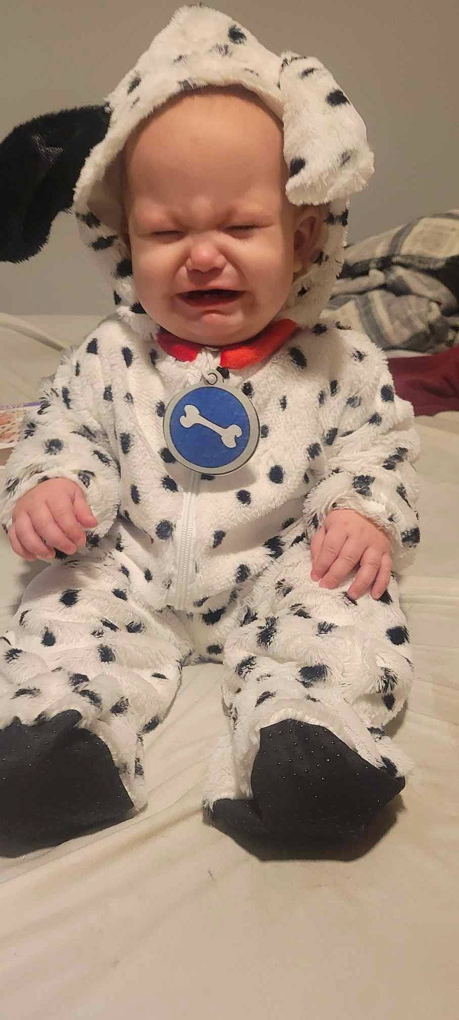 Navii is registered to the contest to win money with this photo: baby, baby_products, baby_toddler_clothing, cheek, child, comfort, design, face, facial_expression, happy, head, linens, nose, pattern, person, skin, sleeve, textile, toddler, vertebrate