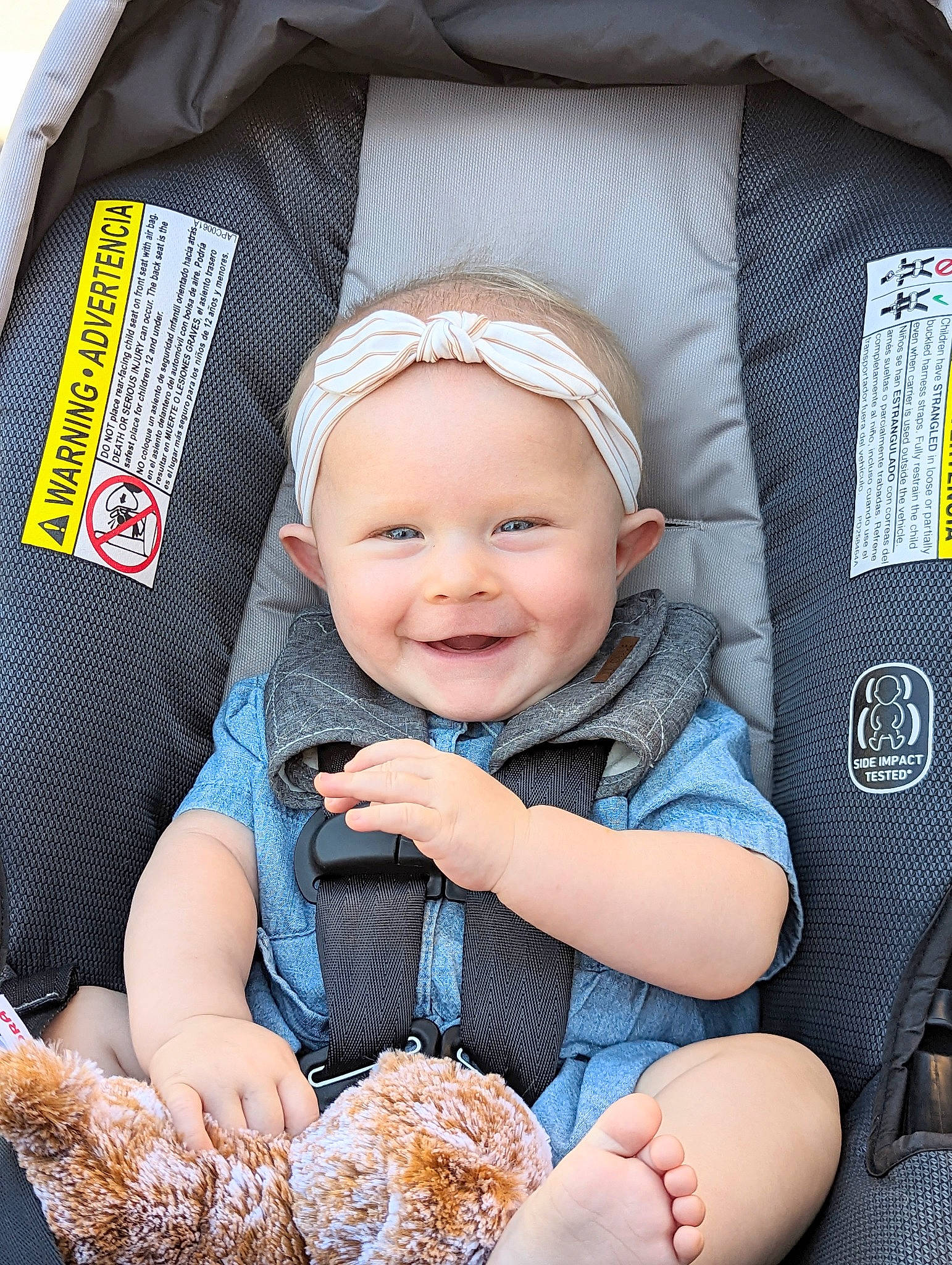 Emmalyn is registered to the contest to win money with this photo: baby, baby_carriage, baby_products, baby_toddler_clothing, basket, car_seat, child, comfort, electric_blue, fashion_accessory, happy, headwear, joy, pattern, person, photograph, product, sitting, sleeve, smile