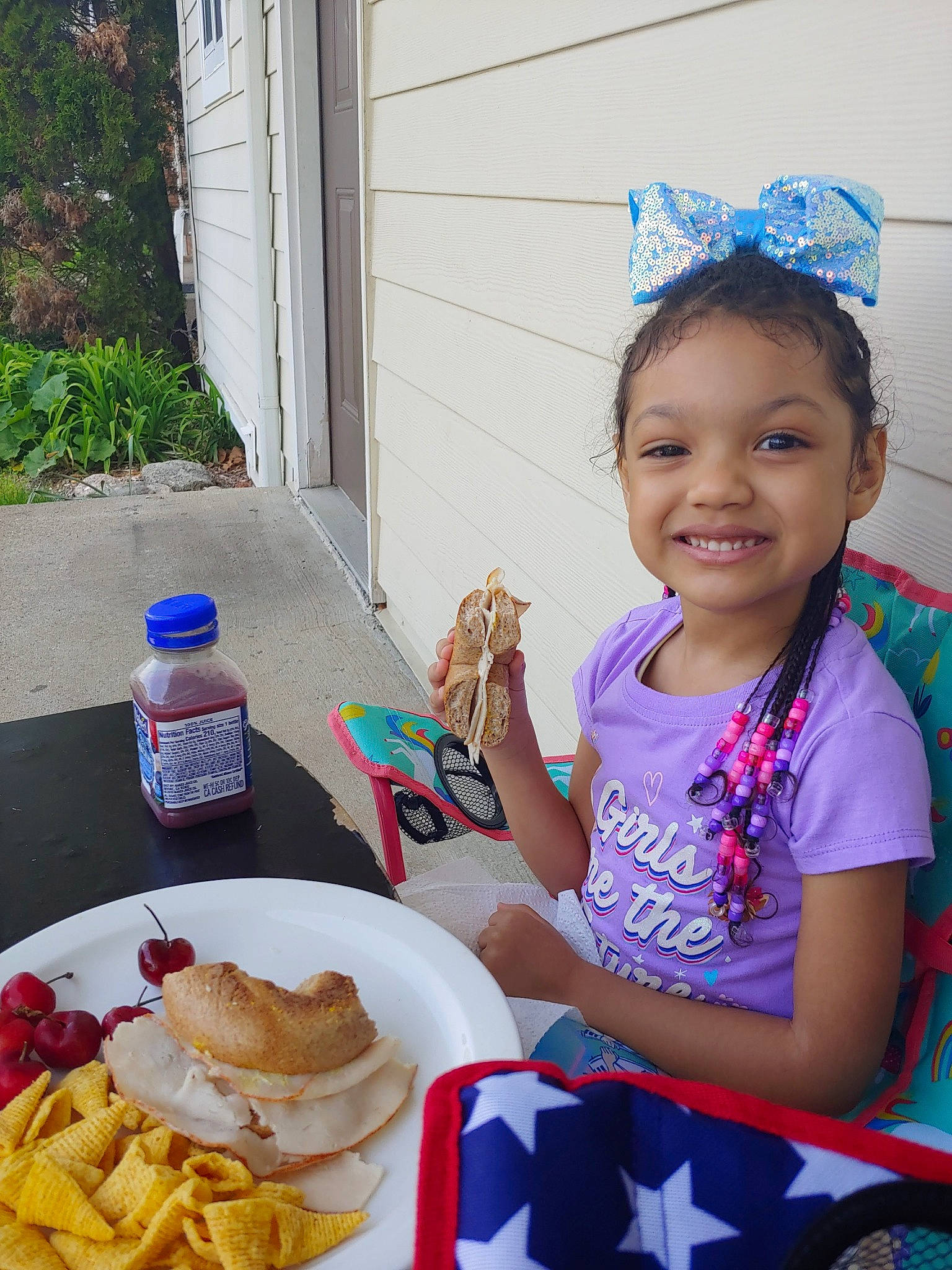 Annalisa is registered to the contest to win money with this photo: blue, bottle, cuisine, dish, event, fast_food, finger_food, food, french_fries, happy, ingredient, joy, junk_food, person, plant, plate, sharing, smile, summer, table