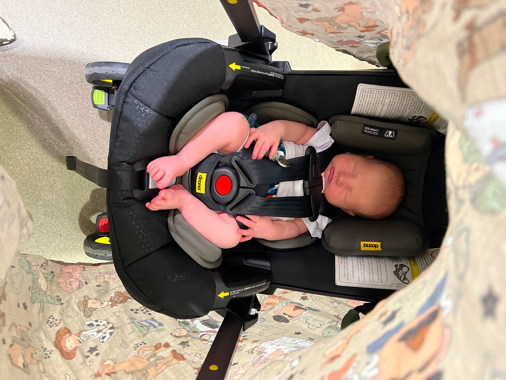 Drew is registered to the contest to win money with this photo: auto_part, automotive_wheel_system, baby, baby_carriage, baby_in_car_seat, baby_products, baby_safety, baby_toddler_clothing, car_seat, child, comfort, diving_mask, dry_suit, motor_vehicle, person, personal_protective_equipment, service, tire, toddler, vehicle_door