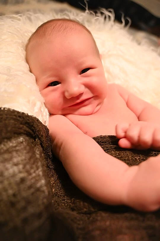 Drew is registered to the contest to win money with this photo: baby, baby_toddler_clothing, cheek, child, chin, comfort, eye, eyebrow, finger, flash_photography, gesture, happy, iris, lip, mouth, nose, person, skin, smile, thumb