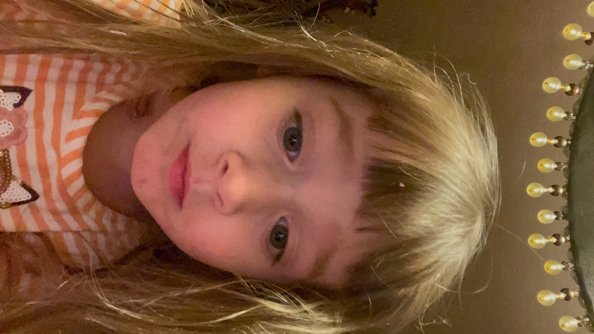 Thea is registered to the contest to win money with this photo: cheek, dress, ear, eye, eyebrow, eyelash, face, flash_photography, happy, head, iris, jaw, lip, neck, nose, person, plant, skin, smile, tree