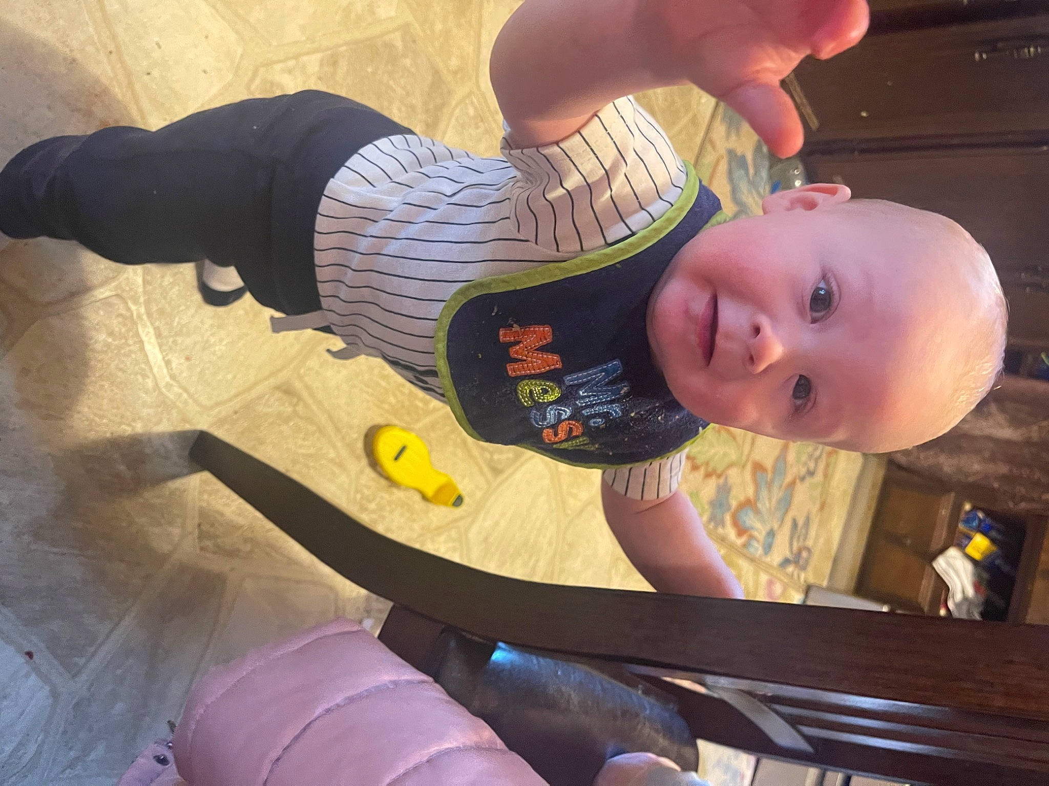 Theo is registered to the contest to win money with this photo: arm, baby, baby_products, child, elbow, finger, fun, gesture, hand, happy, human_leg, knee, leisure, nail, person, sitting, smile, thigh, thumb, toddler