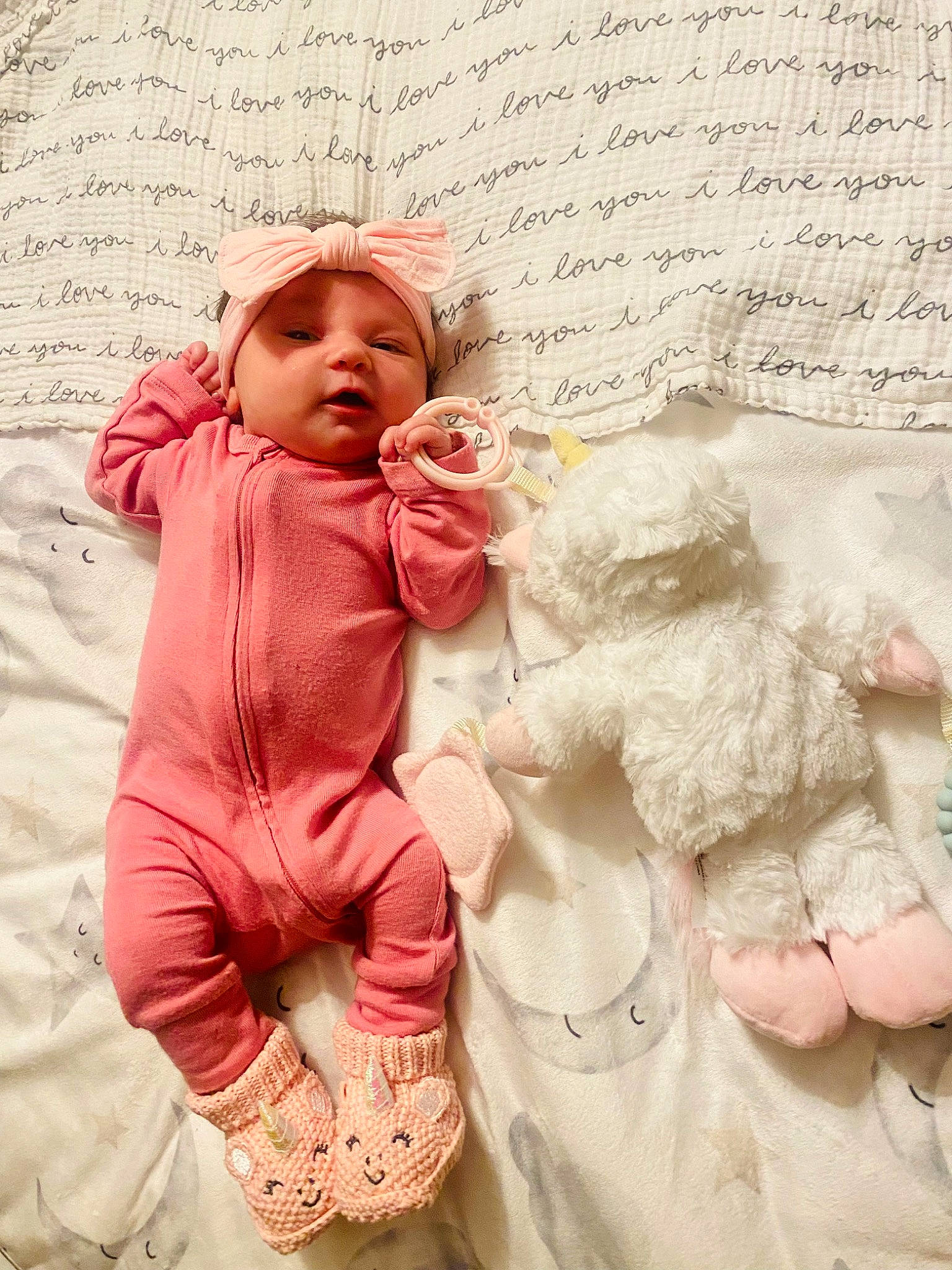 Emalyn is registered to the contest to win money with this photo: baby, baby_toddler_clothing, child, font, fur, gesture, hand, handwriting, happy, headwear, linens, magenta, pattern, peach, people, people_in_nature, person, pink, skin, sleeve