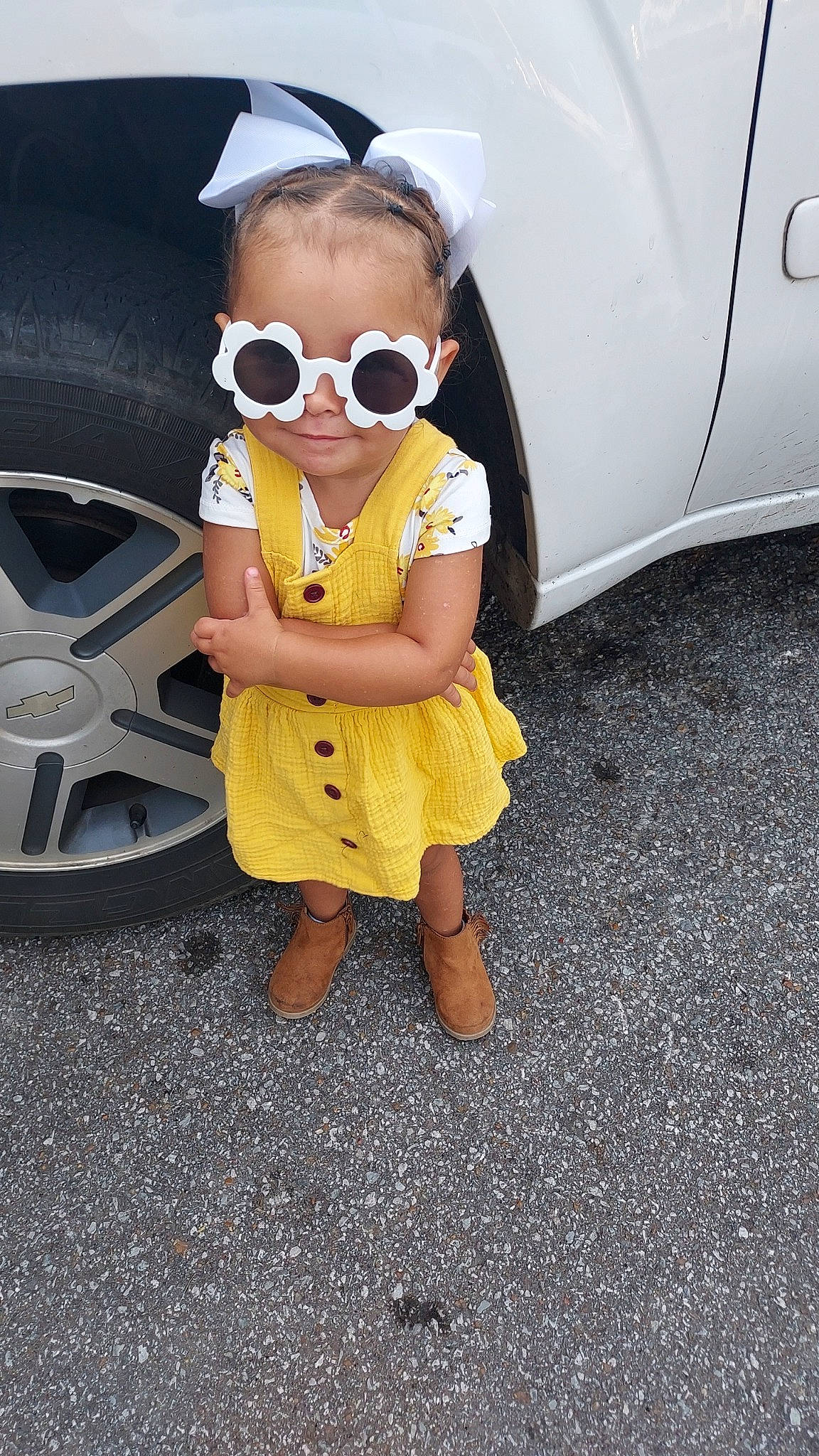 A'Myia joined the competition — help win amazing prizes! asphalt, auto_part, automotive_design, automotive_exterior, automotive_lighting, automotive_tire, baby_toddler_clothing, bumper, car, eyewear, fender, goggles, motor_vehicle, person, road_surface, sunglasses, tire, toddler, vehicle_door, vision_care