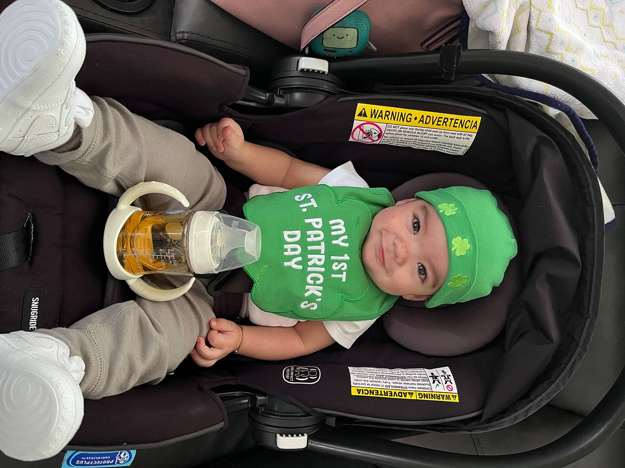 Cassius joined the competition — help win amazing prizes! auto_part, automotive_design, baby, baby_carriage, baby_products, baby_safety, bag, car_seat, child, comfort, elbow, glove, green, headwear, lap, motor_vehicle, person, personal_protective_equipment, product, sitting
