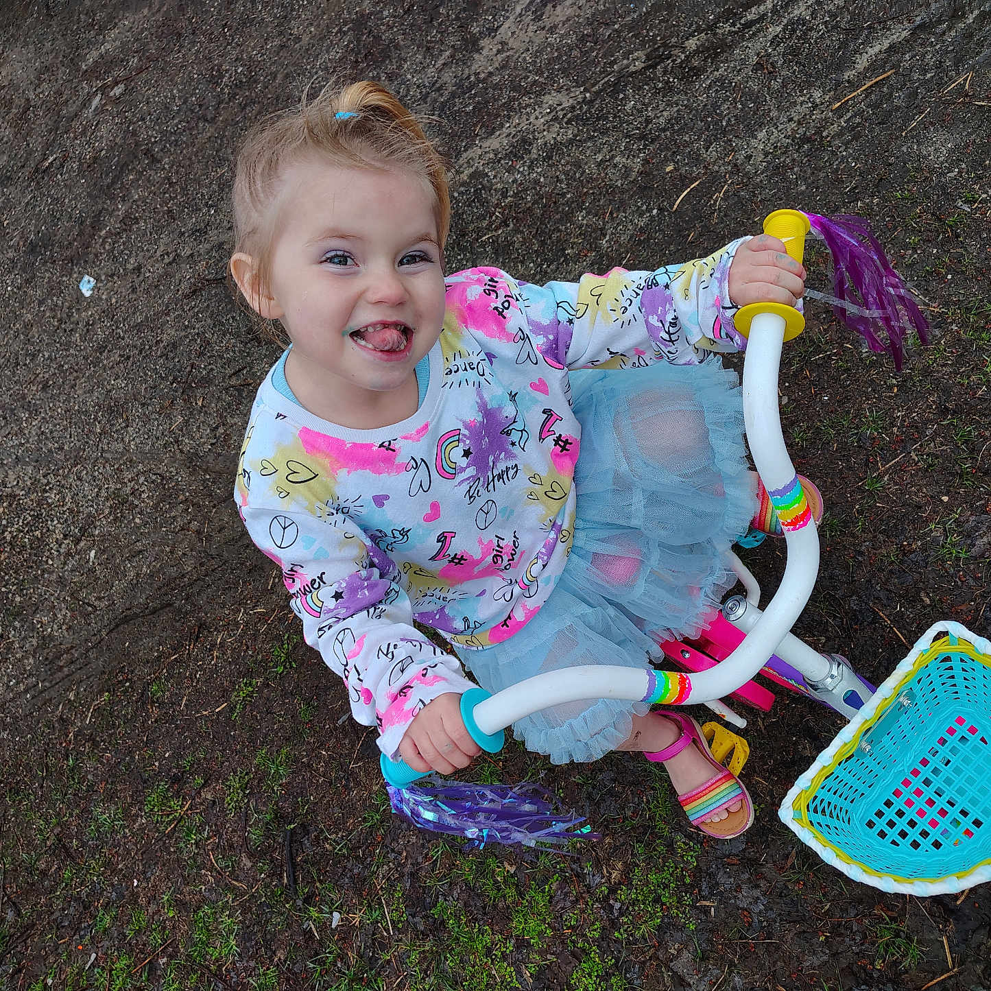 Emma'Jean is registered to the contest to win money with this photo: baby, basket, bicycle, face, grass, head, nature, outdoorplayarea, outdoors, person, photography, plant, playarea, portrait, purple, soil, transportation, tricycle, vehicle, yard