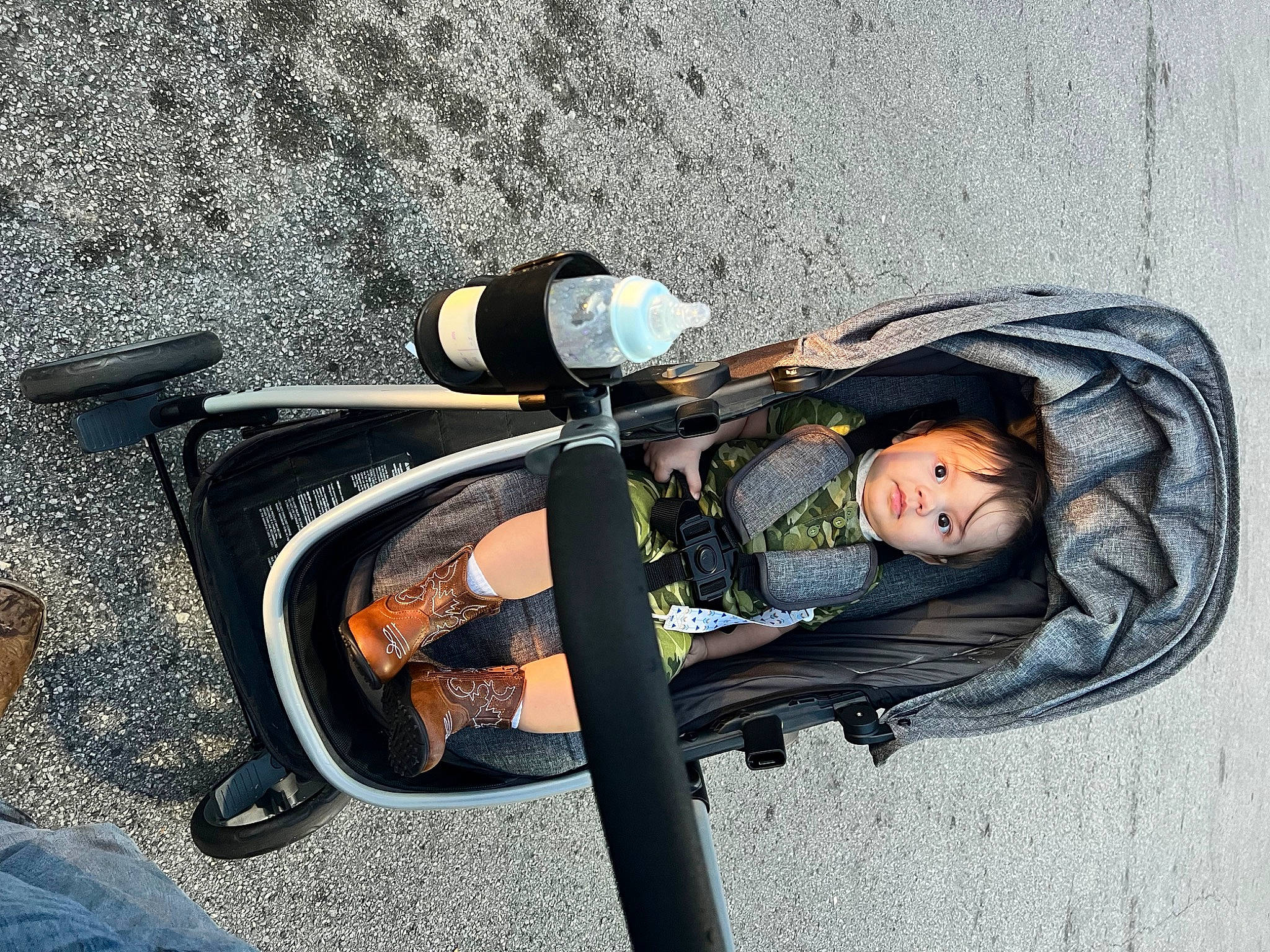 Wyatt is registered to the contest to win money with this photo: asphalt, auto_part, automotive_lighting, automotive_tire, automotive_wheel_system, baby_carriage, bicycle, bicycle_accessory, bicycle_fork, bicycle_frame, bicycle_handlebar, bicycle_part, bicycle_tire, bicycle_wheel, bicycles_equipment_and_supplies, comfort, person, recreation, spoke, tire