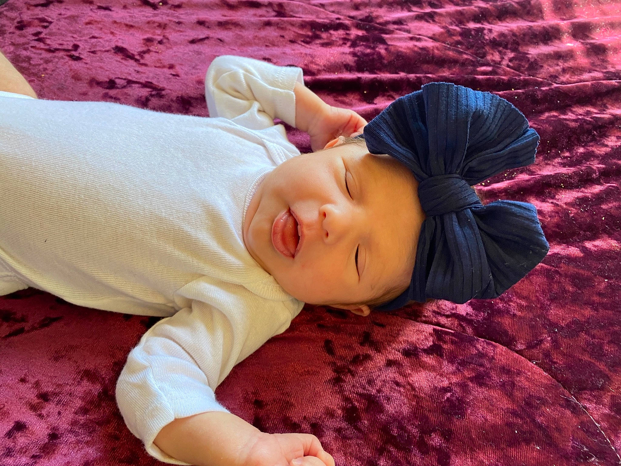 Adalynn joined the competition — help win amazing prizes! bed_sheet, bedding, comfort, flash_photography, fun, grass, hairstyle, happy, head, headwear, linens, lip, magenta, pattern, person, pink, sitting, sleeve, textile, toddler