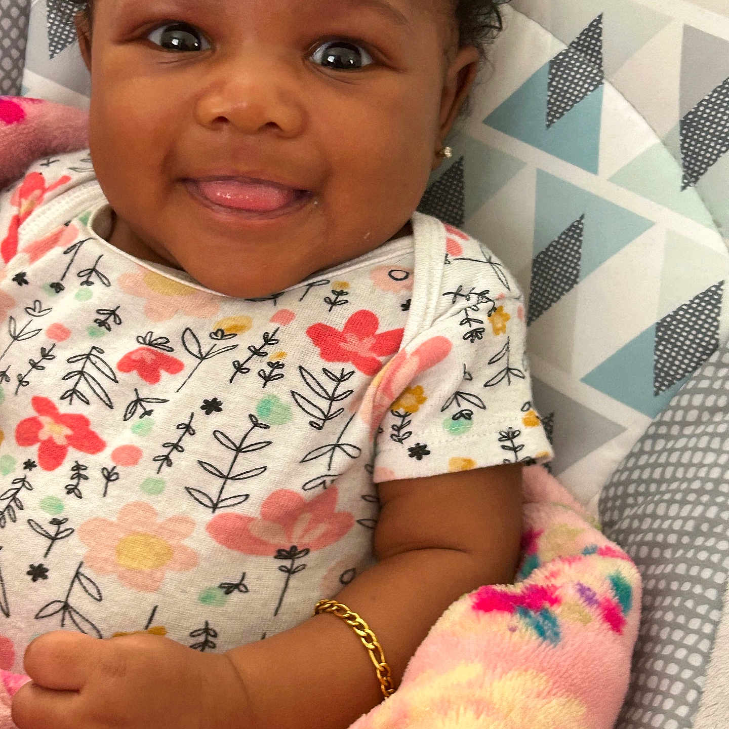 Tru is registered to the contest to win money with this photo: accessories, baby, bracelet, clothing, couch, cushion, earring, face, furniture, happy, head, homedecor, jewelry, necklace, person, photography, portrait, quilt, smile, t_shirt