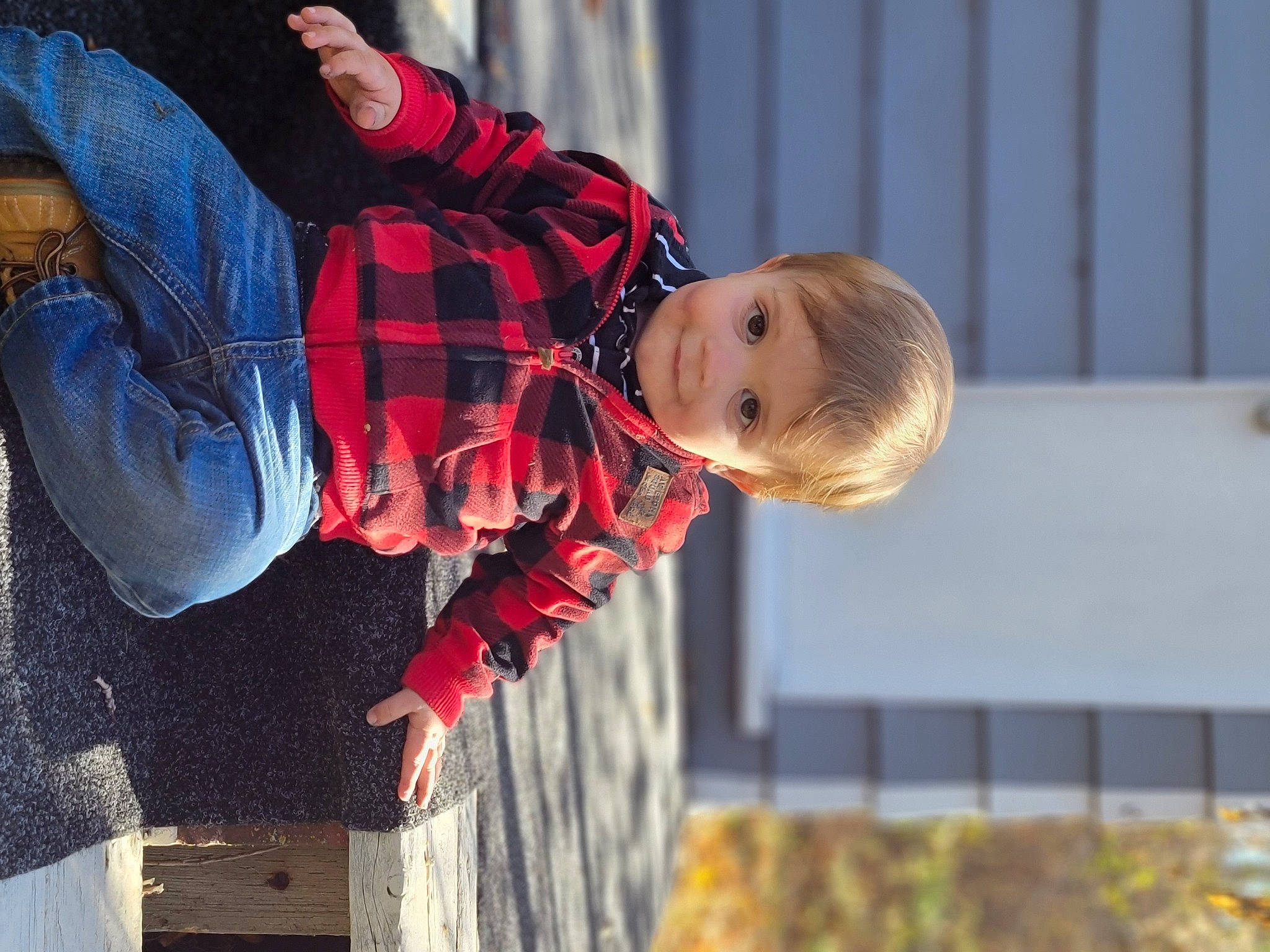 Declan is registered to the contest to win money with this photo: baby, child, electric_blue, event, fun, happy, leisure, pattern, person, plaid, smile, tartan, toddler, tree, vacation, water, winter, wood, yellow