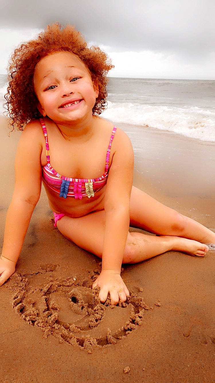 Nariyah joined the competition — help win amazing prizes! arm, barefoot, beach, beauty, body_of_water, flash_photography, foot, fun, happy, head, human_body, human_leg, joy, people_in_nature, people_on_beach, person, sand, sky, smile, thigh
