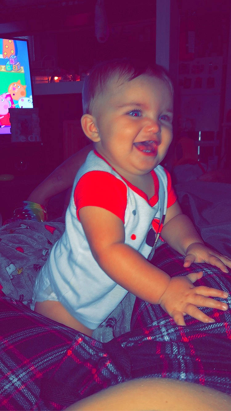 Avery is registered to the contest to win money with this photo: baby, baby_toddler_clothing, child, cool, electric_blue, flash_photography, fun, happy, iris, magenta, pattern, person, pink, plaid, purple, red, skin, smile, standing, tartan