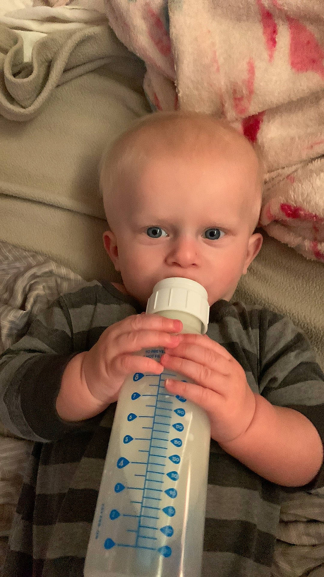 Weston joined the competition — help win amazing prizes! baby, baby_products, baby_toddler_clothing, cheek, child, comfort, drinkware, ear, eye, eyelash, finger, hand, measuring_instrument, nail, nose, person, plastic_bottle, room, skin, thumb
