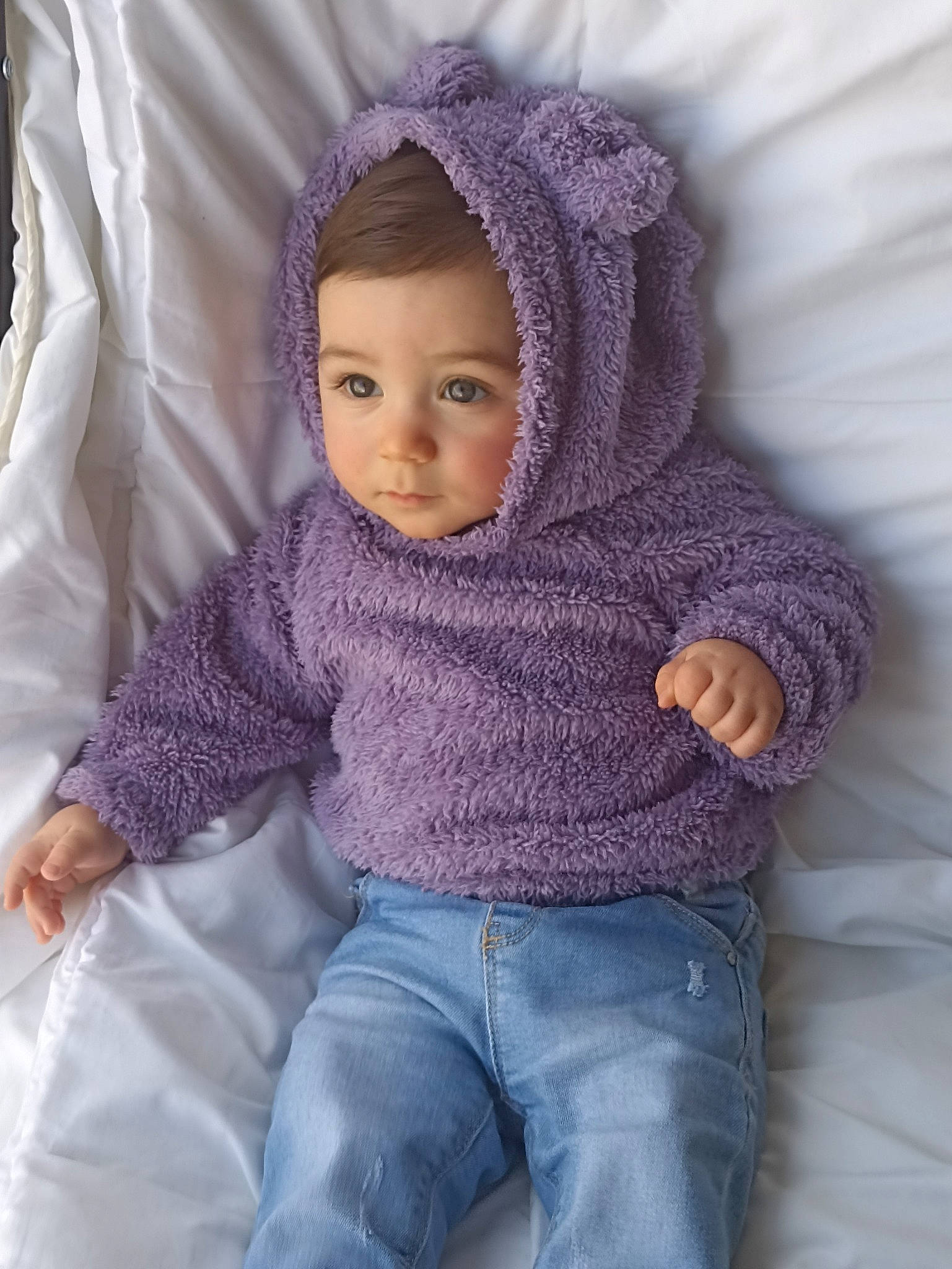 Paco participe au concours pour gagner de l'argent avec cette photo : baby_toddler_clothing, cap, cheek, chin, clothing, comfort, cool, eye, face, facial_expression, head, human_body, iris, nose, person, pink, product, purple, skin, sleeve