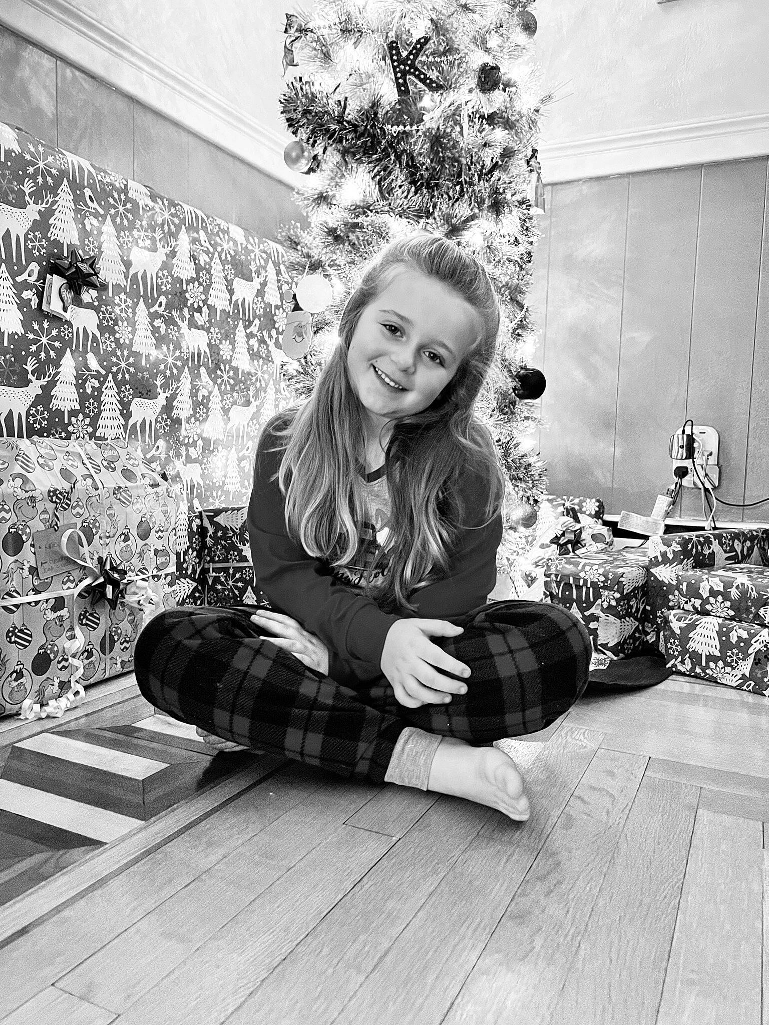 Kinley joined the competition — help win amazing prizes! black, black_and_white, blond, flash_photography, flooring, grass, happy, hardwood, human_leg, joy, knee, monochrome, monochrome_photography, pattern, person, plaid, smile, style, textile, thigh