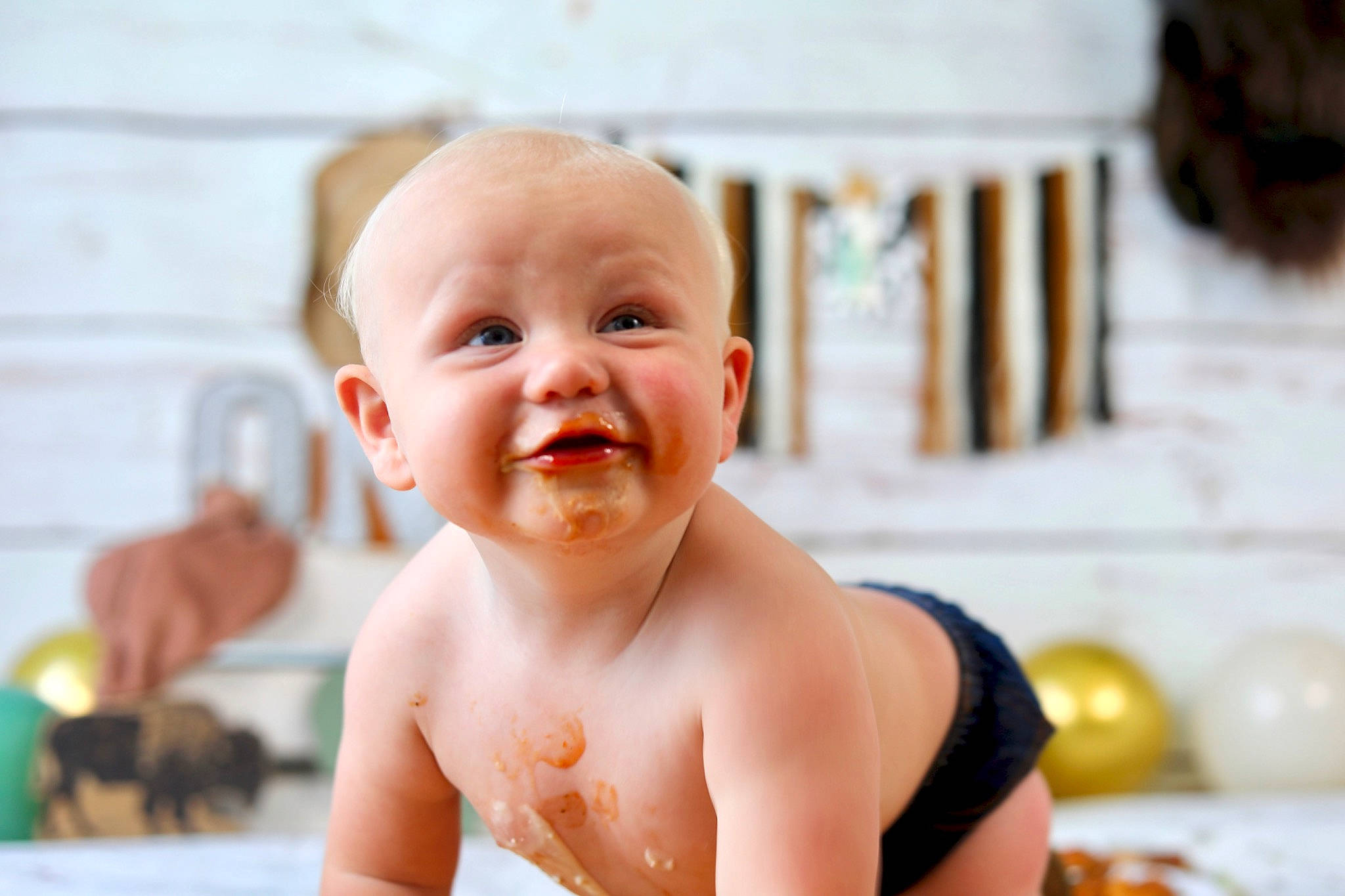 Zakary is registered to the contest to win money with this photo: baby, baby_toddler_clothing, cheek, chest, child, ear, finger, fun, gesture, happy, leisure, lip, mouth, neck, nose, person, sitting, skin, smile, thumb