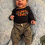 Isaac joined the competition — help win amazing prizes! baby, blanket, blue_blanket, chicago_bears, child, clothing, cute, expression, face, foot, hand, indoors, infant, long_sleeve, lying_down, pants, person, portrait, smiling, soft_texture