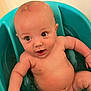 Ezekiel joined the competition — help win amazing prizes! baby, bathtub, water, child, infant, skin, arm, leg, face, expression, happy, bath, sitting, blue, cute, naked, indoors, human, chubby, playful
