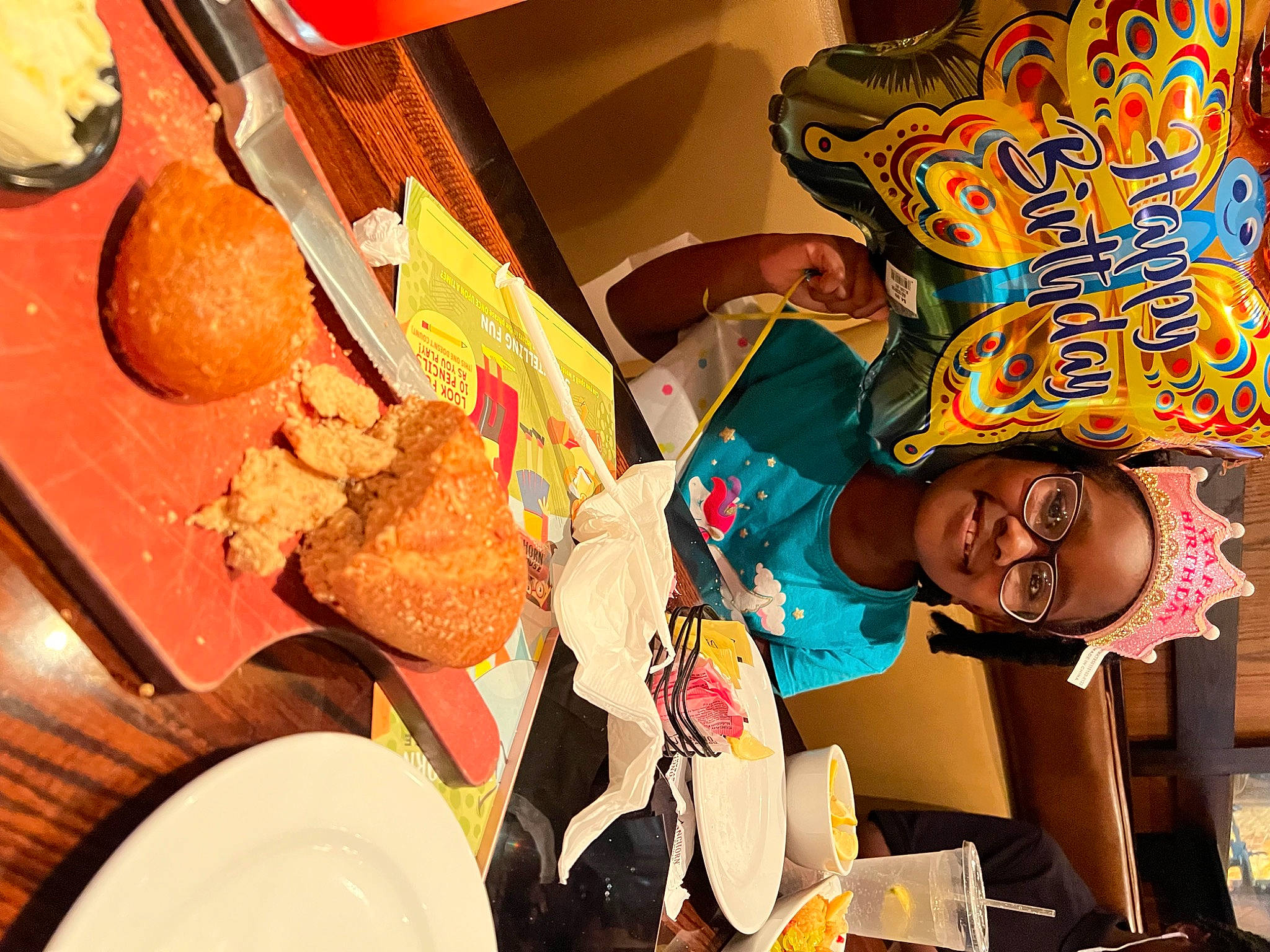 Phoenix is registered to the contest to win money with this photo: baking, box, child, comfort_food, cuisine, dish, food, happy, hat, headwear, ingredient, joy, junk_food, leisure, person, room, smile, snack, sweetness, t_shirt