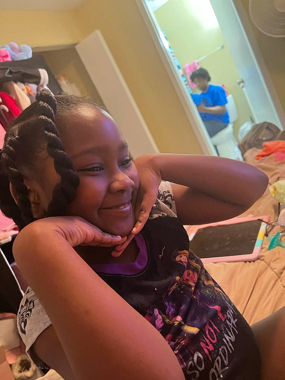 Phoenix is registered to the contest to win money with this photo: abdomen, audio_equipment, black_hair, child, elbow, event, eyewear, fun, happy, interaction, jewellery, joy, leisure, magenta, person, room, shoulder, sitting, smile, t_shirt