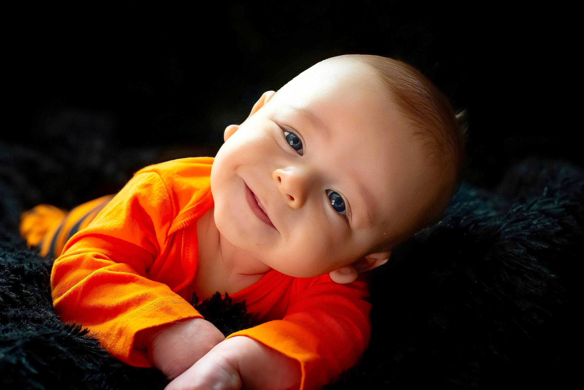 Braden is registered to the contest to win money with this photo: baby, baby_toddler_clothing, cheek, child, darkness, flash_photography, flooring, fun, grass, happy, joy, laugh, nose, person, portrait, portrait_photography, sitting, sleeve, smile, toddler