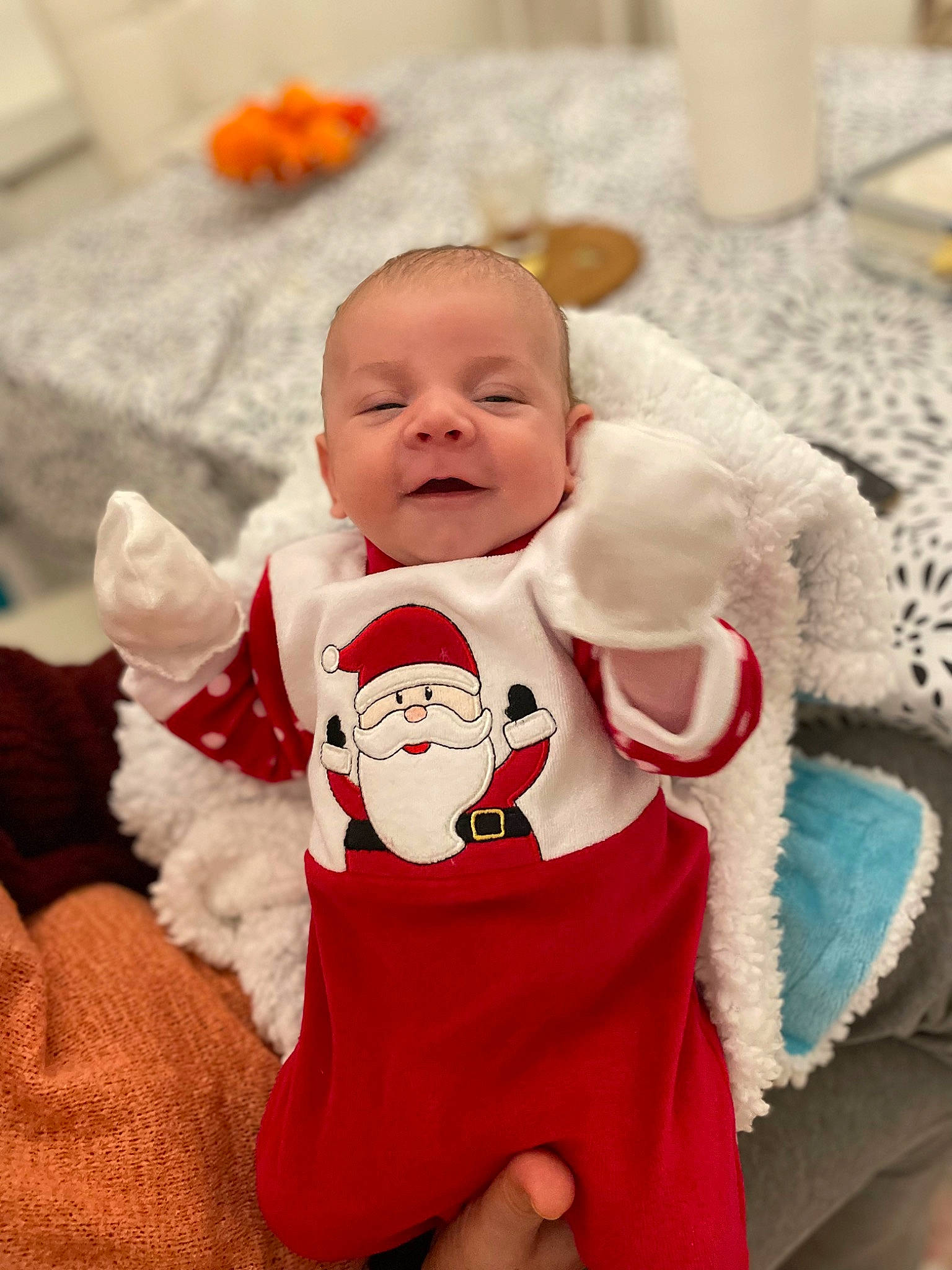 Isaac a rejoint le concours — aidez-le/la à gagner de superbes lots ! baby, baby_toddler_clothing, carmine, cheek, child, christmas, comfort, event, fur, happy, hat, head, headgear, holiday, person, pink, sitting, skin, smile, toddler