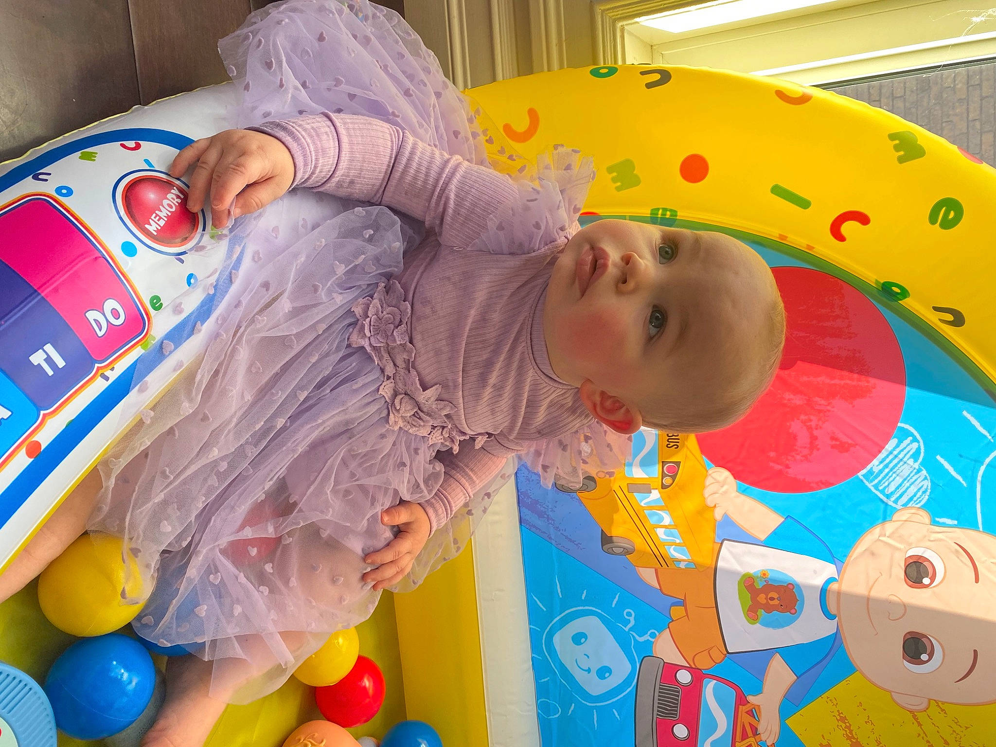 Celine is registered to the contest to win money with this photo: art, baby, baby_products, baby_toys, ball_pit, child, circle, comfort, event, flooring, fun, leisure, pattern, person, plastic, play, recreation, room, toddler, toy