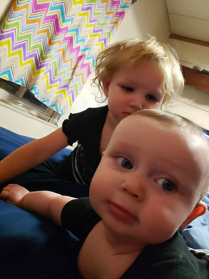 Delilah is registered to the contest to win money with this photo: baby, cheek, child, eye, face, finger, fun, head, leg, person, sitting, skin, smile, toddler