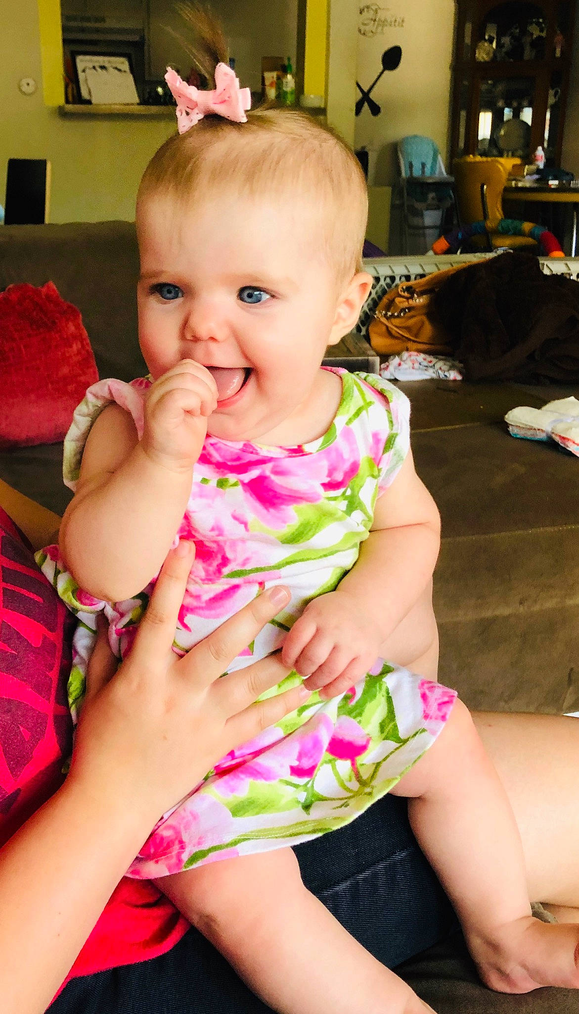 Ann is registered to the contest to win money with this photo: baby, baby_toddler_clothing, beauty, cheek, child, dress, finger, leg, person, pink, play, sitting, skin, smile, toddler