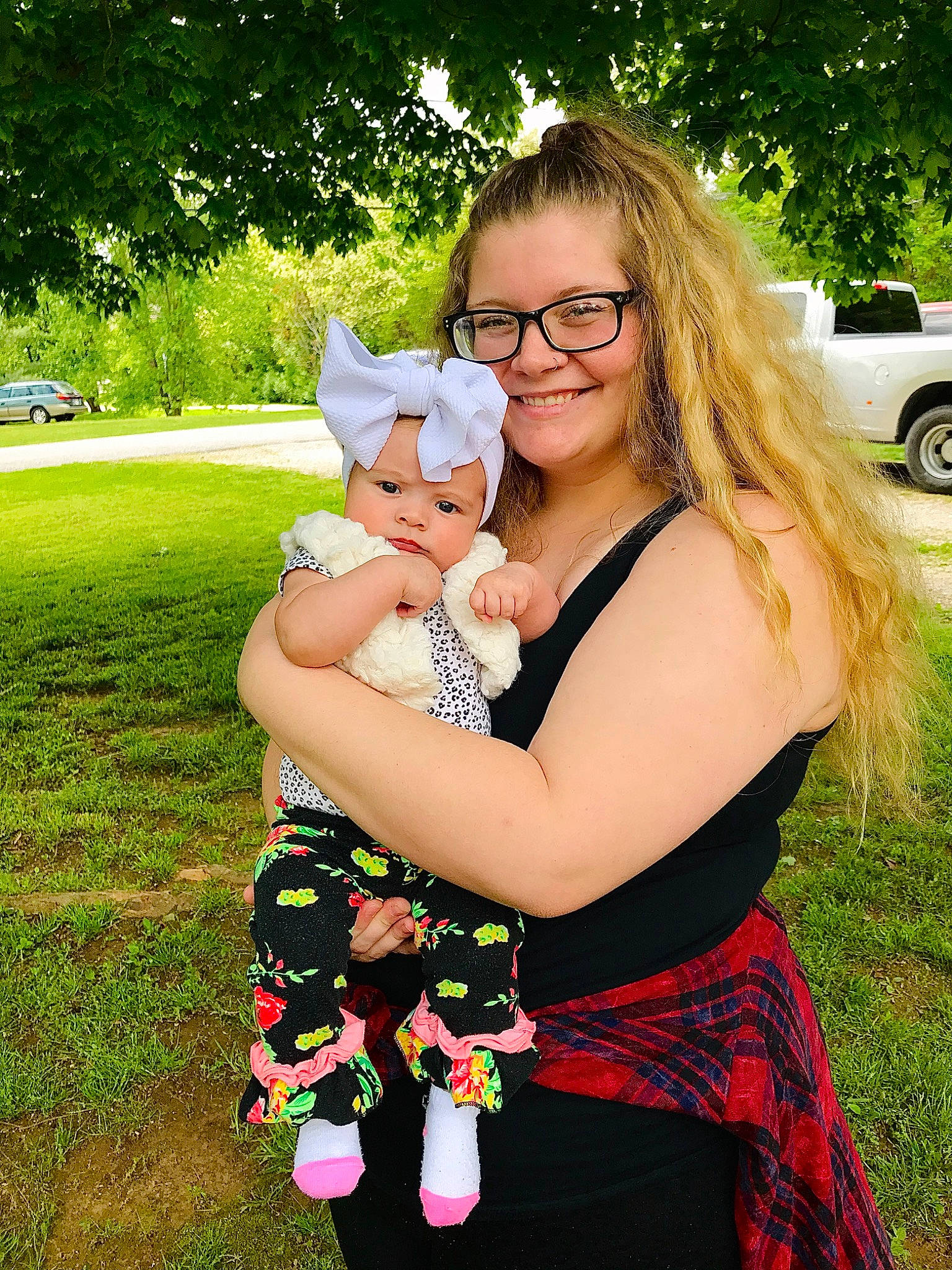 Skylynn joined the competition — help win amazing prizes! abdomen, baby_products, blond, child, dress, fawn, glasses, grass, green, happy, headwear, hug, interaction, joy, person, photography, smile, summer, toddler, tree