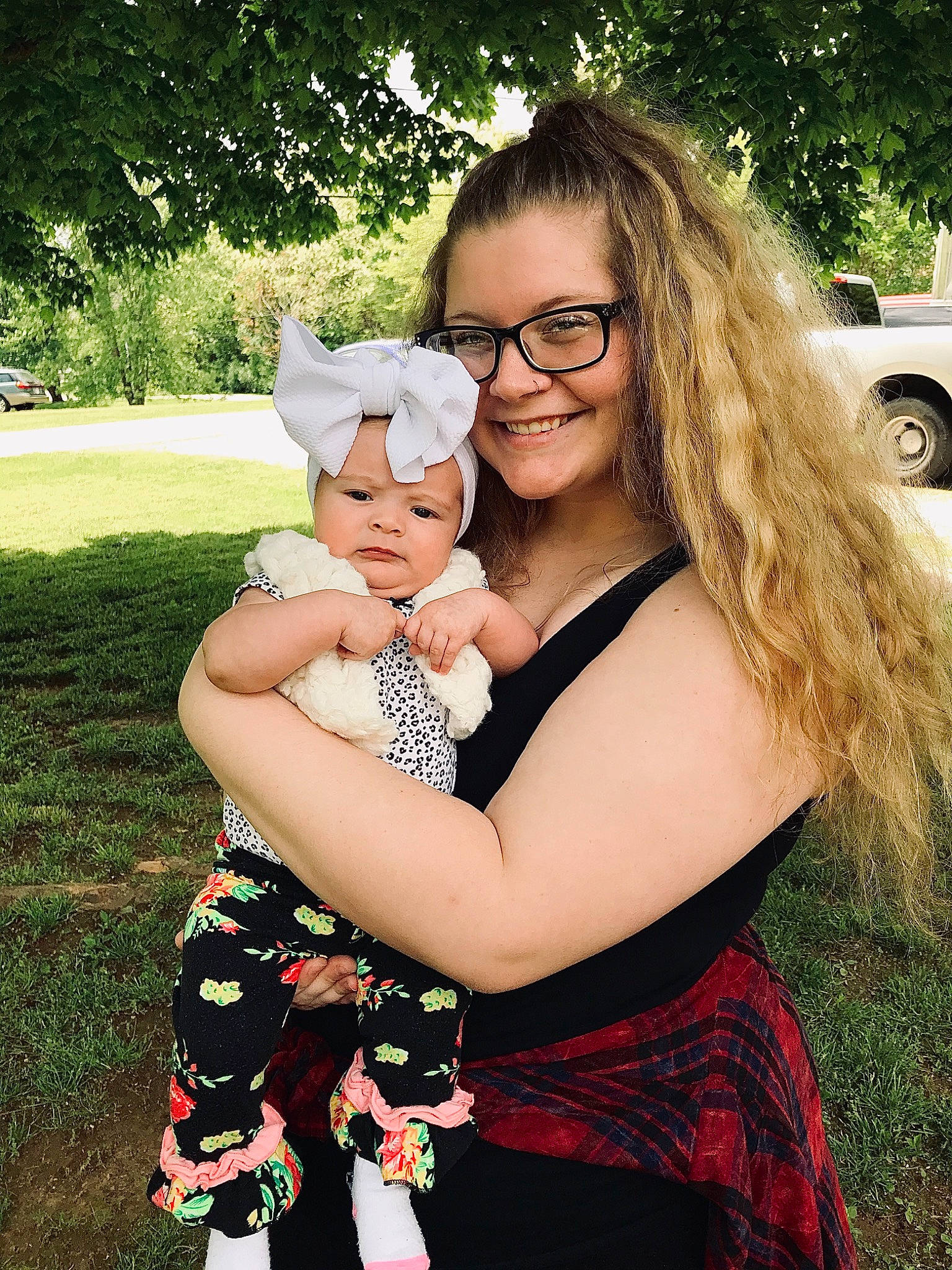 Skylynn is registered to the contest to win money with this photo: blond, child, costume, dress, ear, fun, glasses, grass, happy, head, headwear, hug, interaction, joy, person, photography, smile, toddler