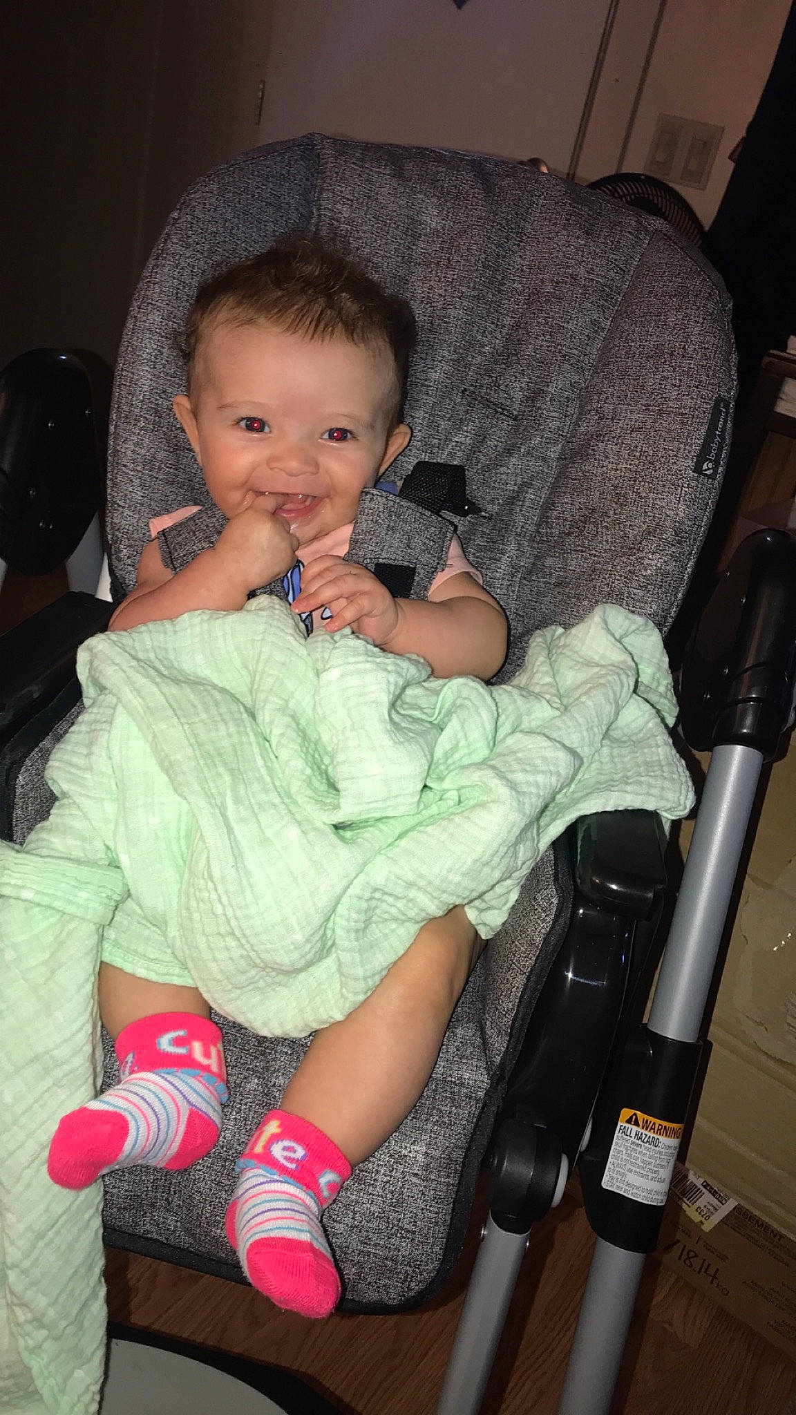 Skylynn is registered to the contest to win money with this photo: baby, cheek, child, eye, finger, iris, joy, lap, leg, lip, person, product, sitting, skin, toddler