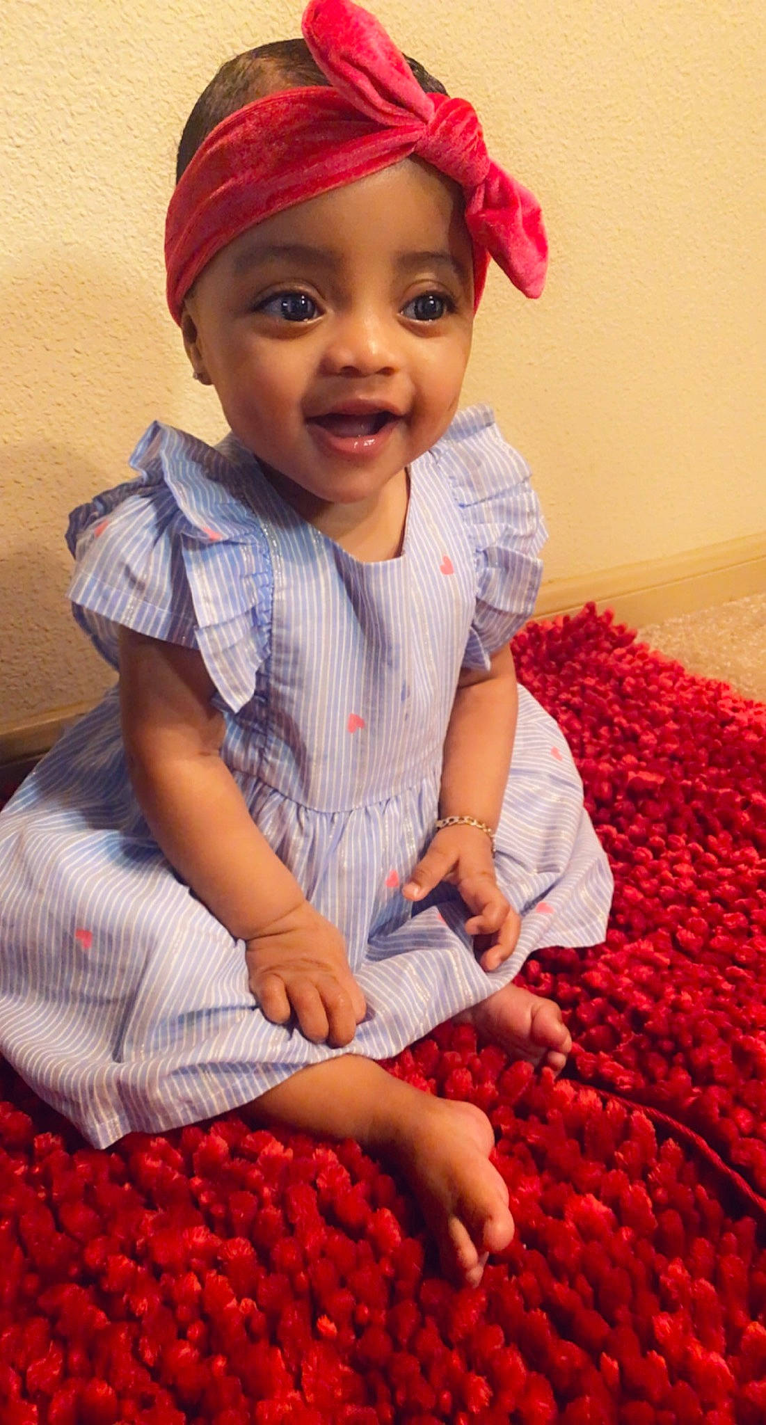 Aubri joined the competition — help win amazing prizes! baby_toddler_clothing, cap, dress, eye, face, finger, food, gesture, hand, happy, head, headwear, natural_foods, person, photograph, product, red, skin, sleeve, smile