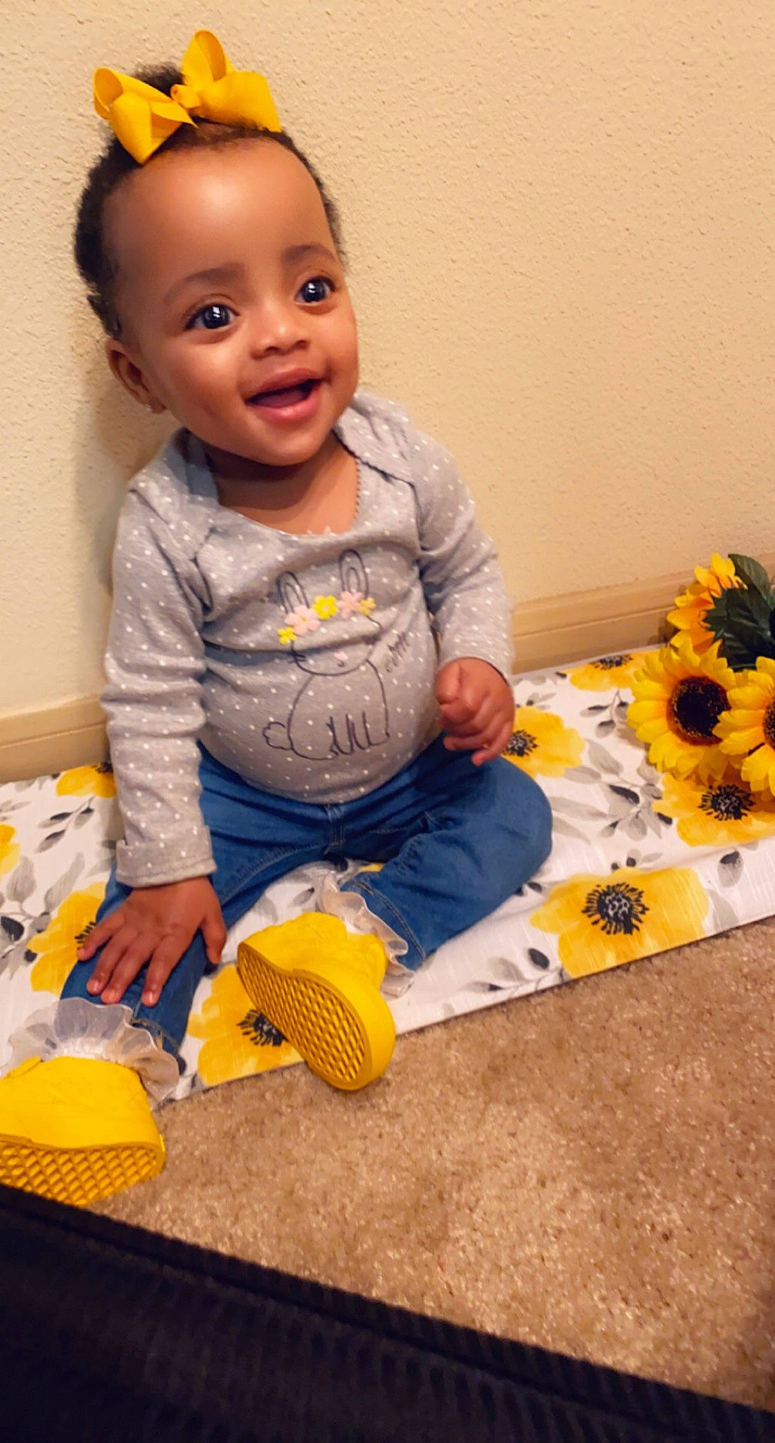 Aubri is registered to the contest to win money with this photo: baby, baby_playing_with_toys, baby_toddler_clothing, cheek, child, flooring, fun, hairstyle, happy, orange, person, plant, shirt, sitting, skin, sleeve, smile, t_shirt, toddler, toy