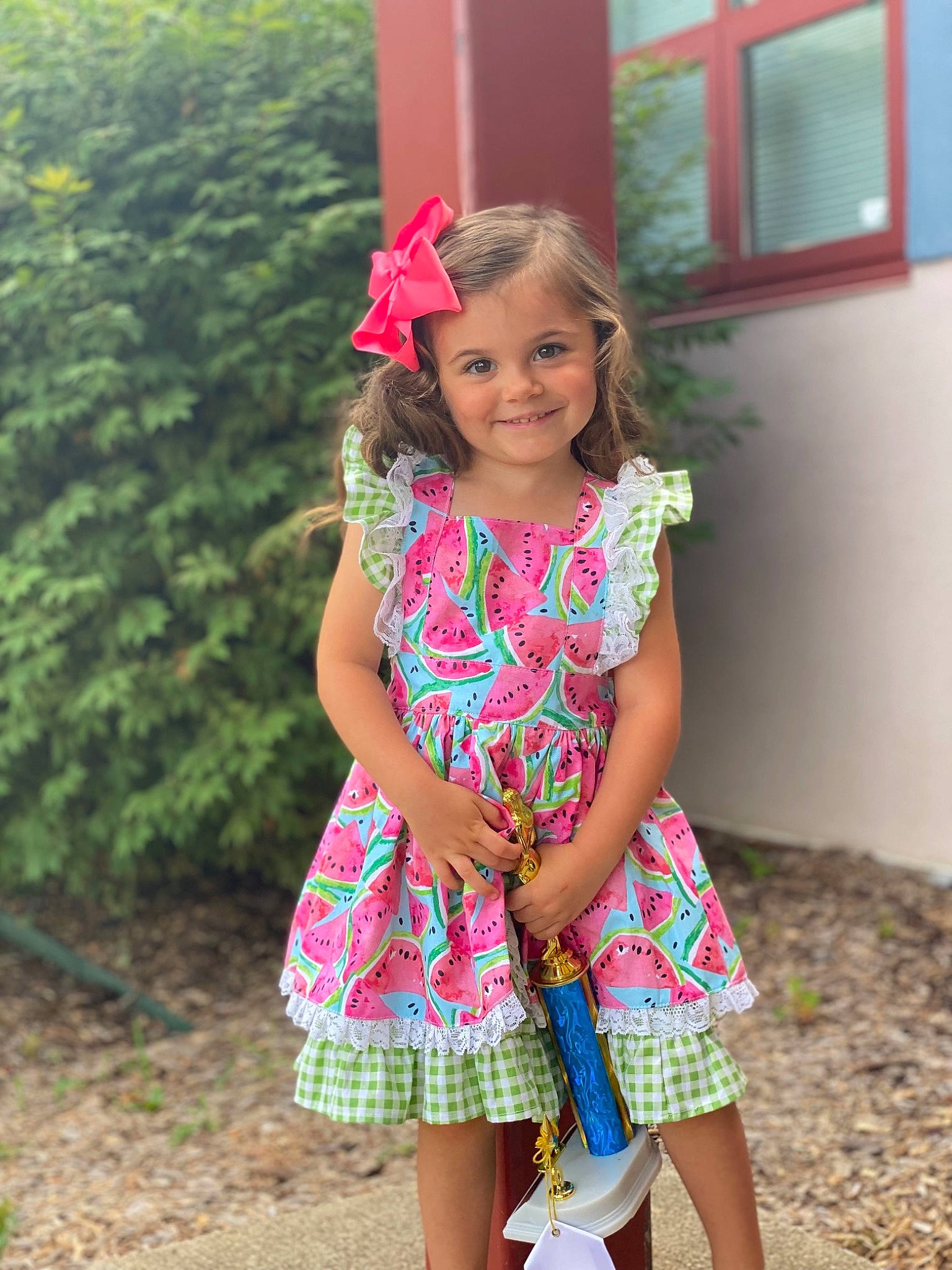 Teagan is registered to the contest to win money with this photo: baby_toddler_clothing, day_dress, dress, eye, face, grass, hair, happy, head, joy, magenta, one_piece_garment, people_in_nature, person, pink, plant, shoulder, smile, summer, toddler