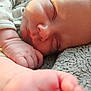 Weston is registered to the contest to win money with this photo: baby, sleeping, newborn, hand, face, skin, blanket, cozy, cute, infant, soft, peaceful, closeup, rest, child, portrait, fist, comfort, young, indoors