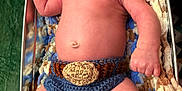 James joined the competition — help win amazing prizes! baby, bare_chest, blanket, blue, brown, cozy, crochet, cute, diaper_cover, eyes, face, fist, hand, indoor, infant, knitted, legs, lying_down, newborn, skin