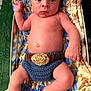baby, infant, blanket, knitted, crochet, diaper_cover, blue, brown, skin, face, eyes, hand, fist, legs, bare_chest, newborn, cute, lying_down, cozy, indoor
