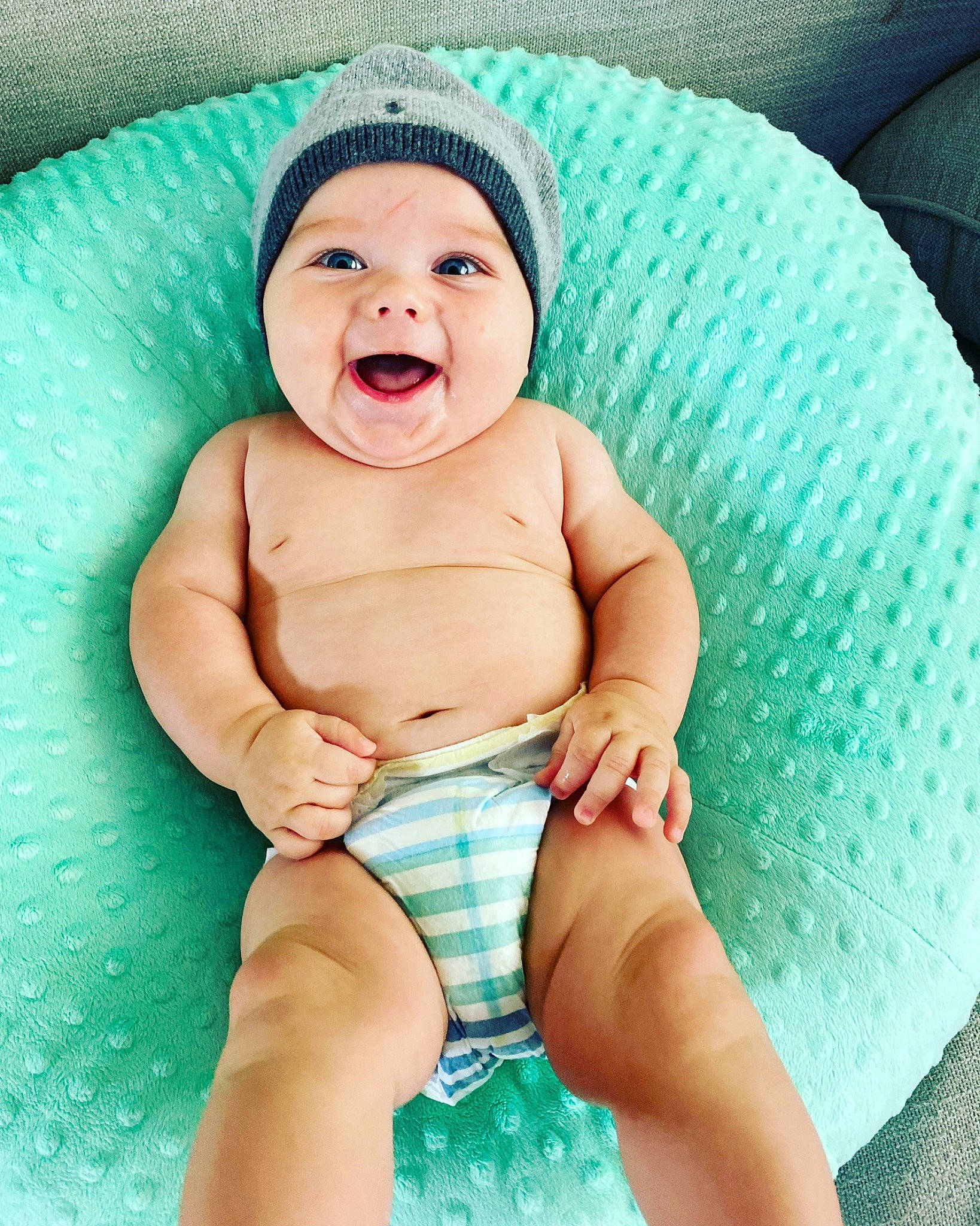 Bennett joined the competition — help win amazing prizes! abdomen, aqua, baby, baby_toddler_clothing, cap, chest, clothing, eye, face, happy, headwear, human_body, knee, leg, mouth, person, skin, smile, stomach, thigh