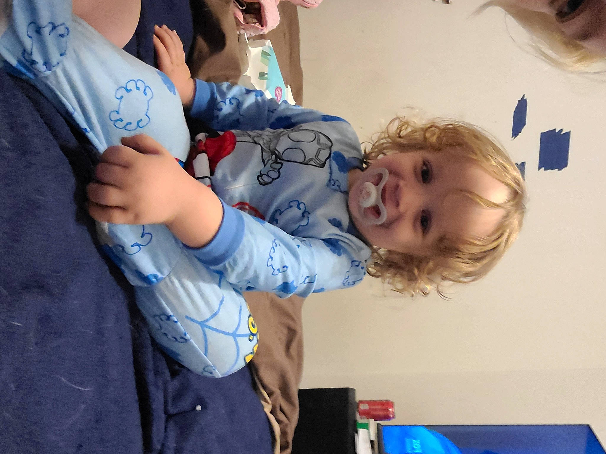 Theo is registered to the contest to win money with this photo: baby, blue, child, elbow, electric_blue, fun, gesture, happy, joint, joy, leisure, person, play, recreation, room, t_shirt, toddler, tree, vacation