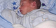 Ronnie joined the competition — help win amazing prizes! newborn, baby, sleeping, blanket, plush_toy, bunny, bed, cozy, infant, soft, comfort, child, cute, resting, indoor, person, peaceful, clothing, hospital, medical_tube